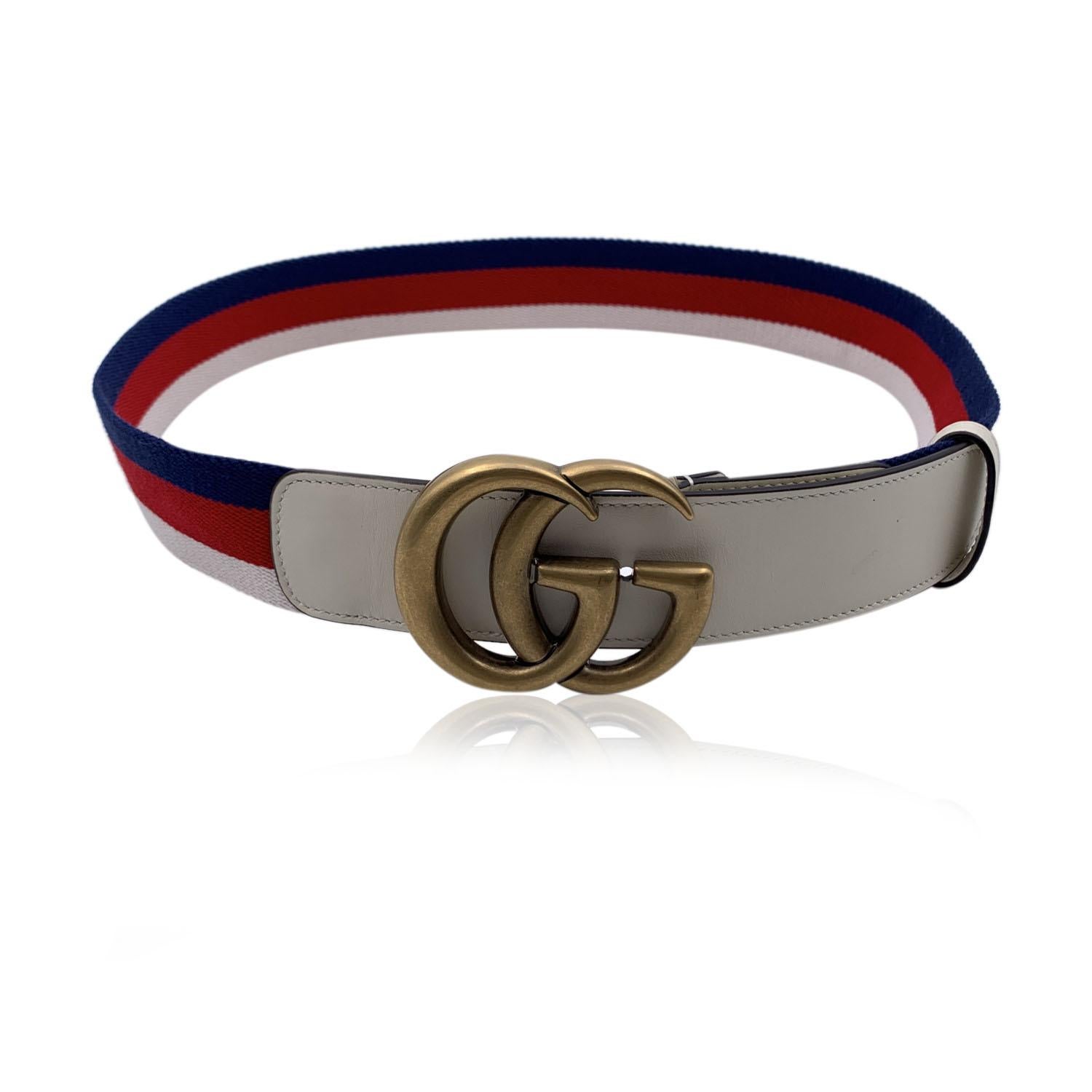 Gucci black leather 'Marmont' unisex belt. Gold metal GG buckle. Width: 1.5 inches - 3.8 cm. 'GUCCI - Made in Italy' engraved on the reverse of the belt, serial number engraved on the reverse of the belt. 3 holes adjustment. Size: 85/34 . Total
