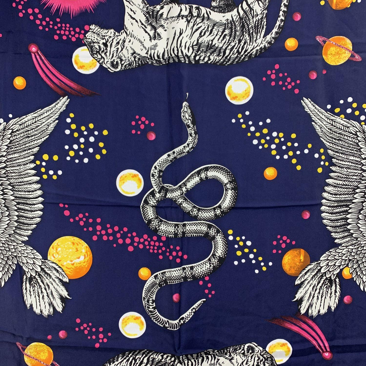 Gucci 'Space Animals' silk scarf. Black space background with tigers, eagles and snake designs.Composition: 100% Silk. Frayed edges. Measurements: 35.5 x 35.5 inches - 90 x 90 cm. Made in Italy


Details

MATERIAL: Silk

COLOR: Black

MODEL: Space
