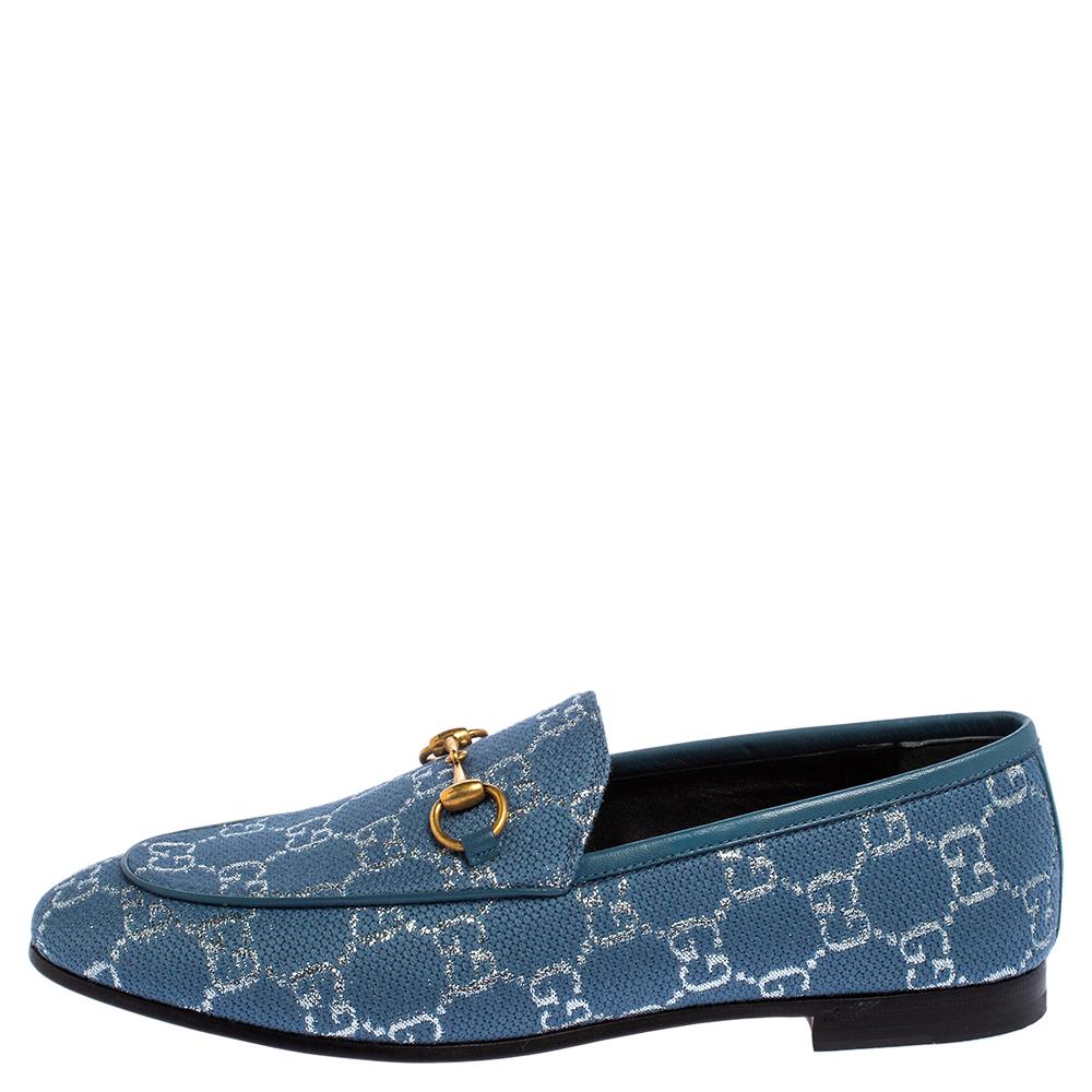 Gucci's much-loved Jordaan loafer in blue fabric enhanced with the GG monogram in shimmery lamé. The comfortable shoes have been crafted beautifully and they come flaunting the Horsebit detail in gold-tone on the uppers. The loafers are ideal to