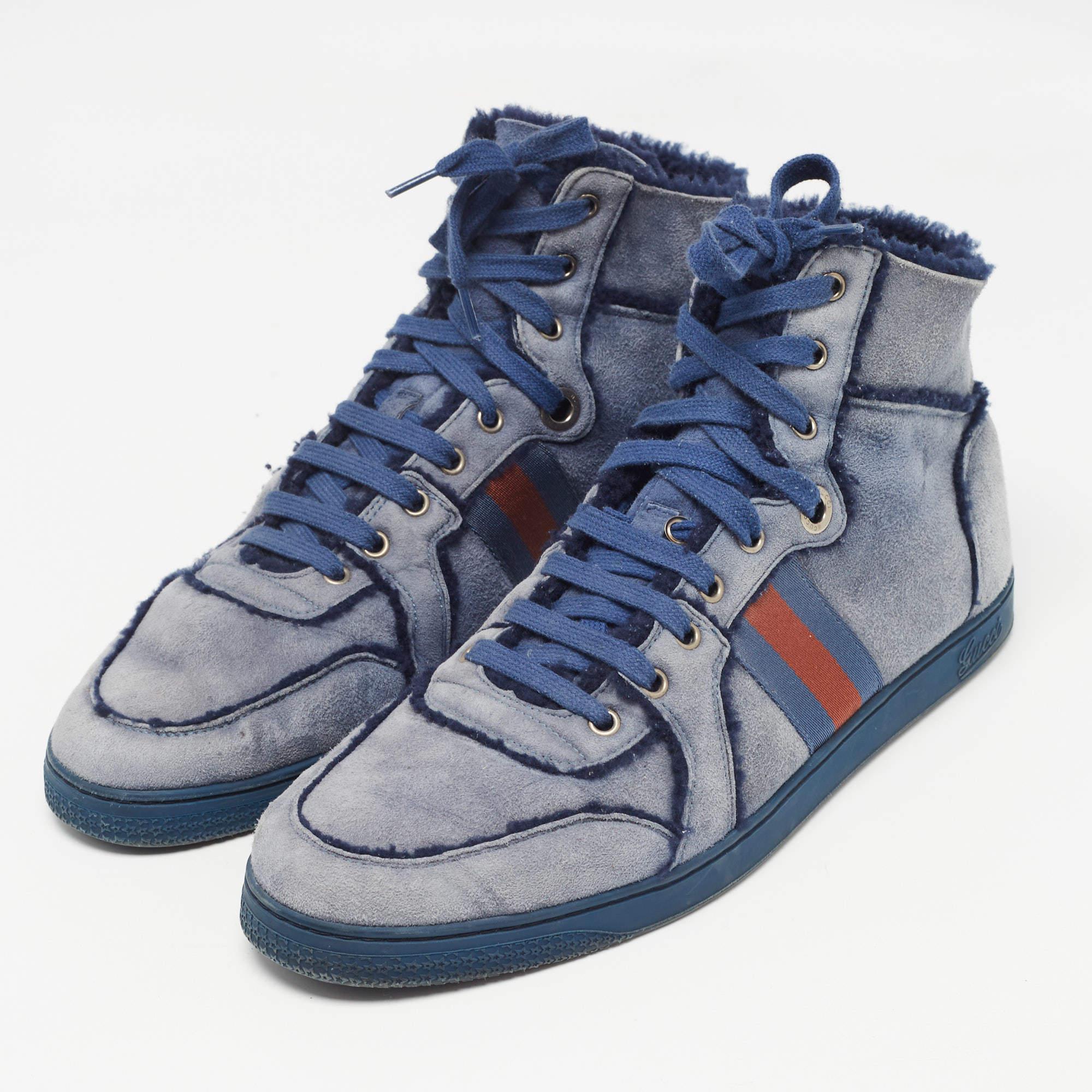Crafted with skill these Gucci high top sneakers feature a luxe design with signature detailing. You can count on them to elevate any outfit. Embrace the ultimate in sophistication and comfort with every step you take.