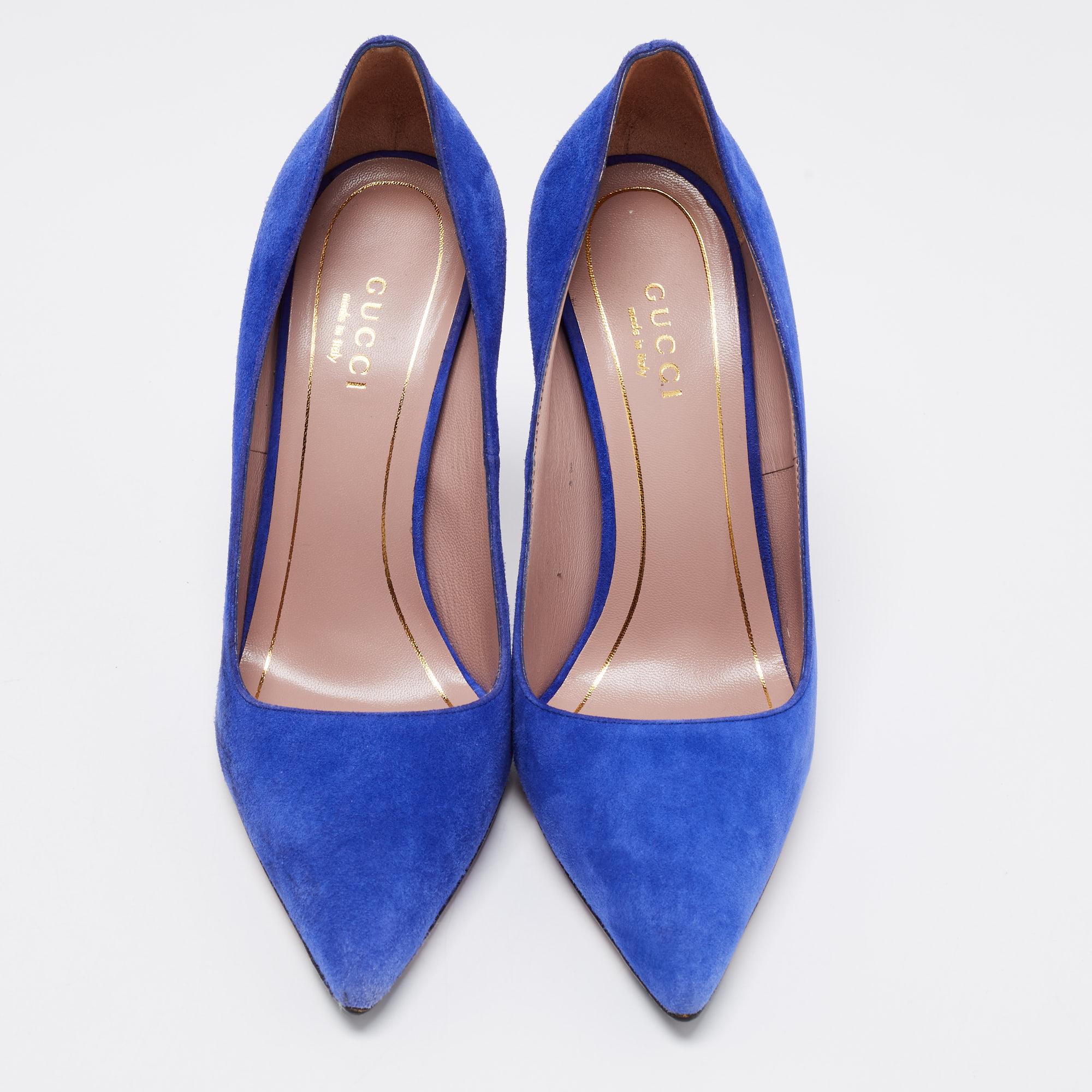 Take every step with elegance and style in these gorgeous pumps from the House of Gucci. They are crafted meticulously using blue suede. They showcase pointed toes, slender heels, and a slip-on feature. These beautiful Gucci pumps will be your