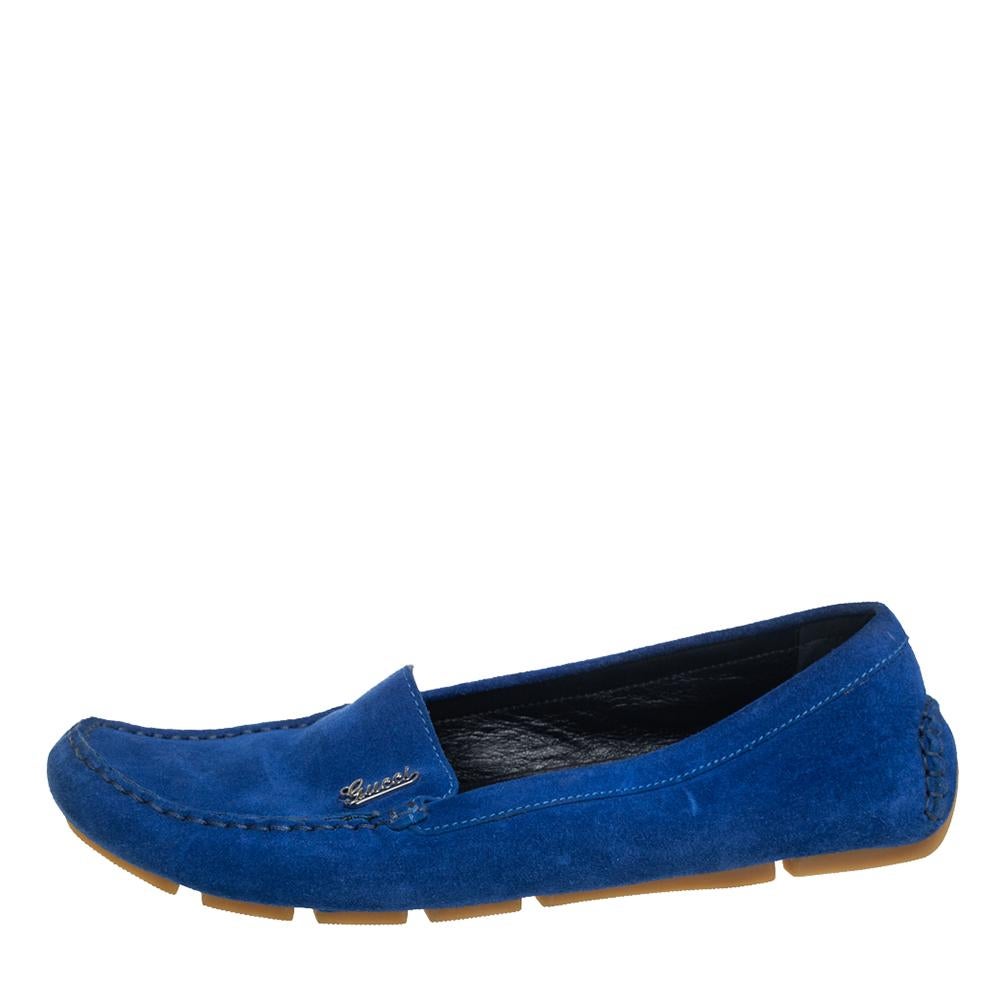 These slip-on loafers from Gucci are the ideal pair you'll love having in your closet. They are crafted from suede in a smart blue color and feature round toes and silver-tone 'Gucci' signature details on the vamps. They are complete with