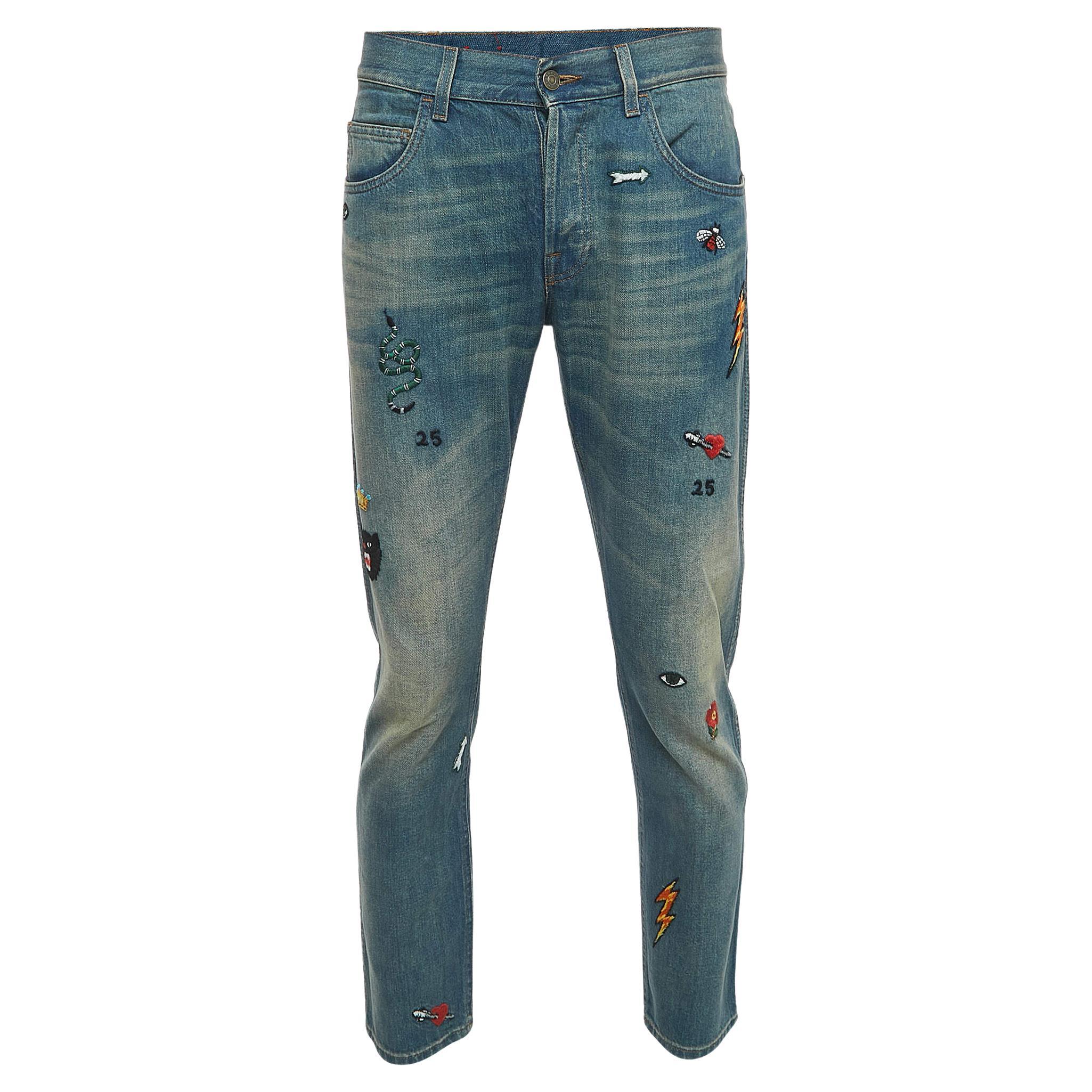 Blau gewaschene und bestickte Denim-Jeans von Gucci mit L-Taille 34"
