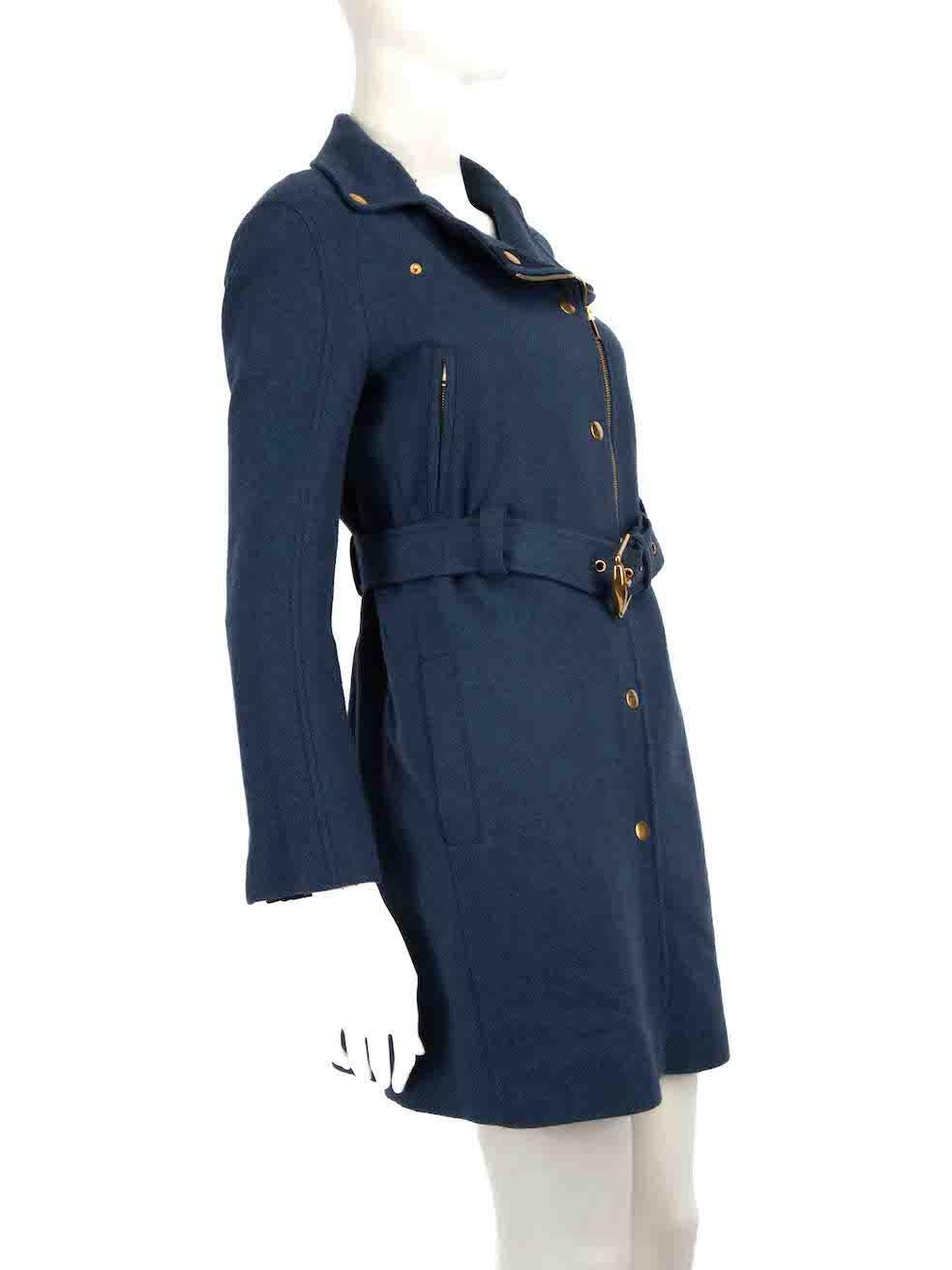 CONDITION is Very good. Minimal wear to coat is evident. Light tarnishing to metal hardware and some bobbling to the side panels underneath the arms on this used Gucci designer resale item.
 
Details
Blue
Wool
Mid length coat
Single breasted with