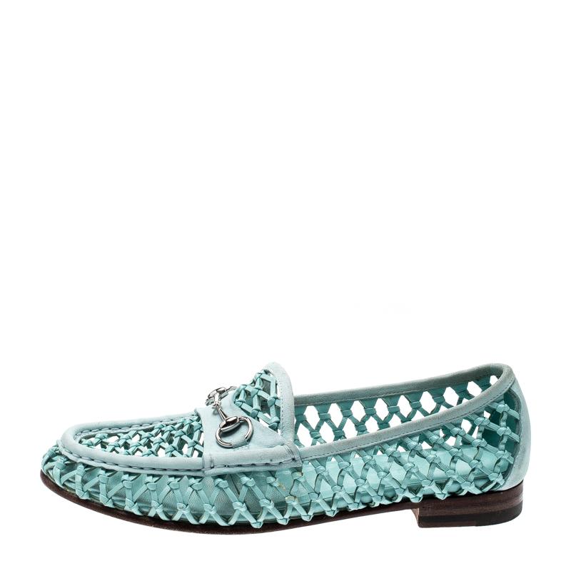 For a look that is sure to create a trend amongst the daring fashion lovers, these Gucci loafers will be a wise buy. Crafted in blue woven leather with a see-through weaving, these loafers feature the signature horsebit detailing on the vamps for