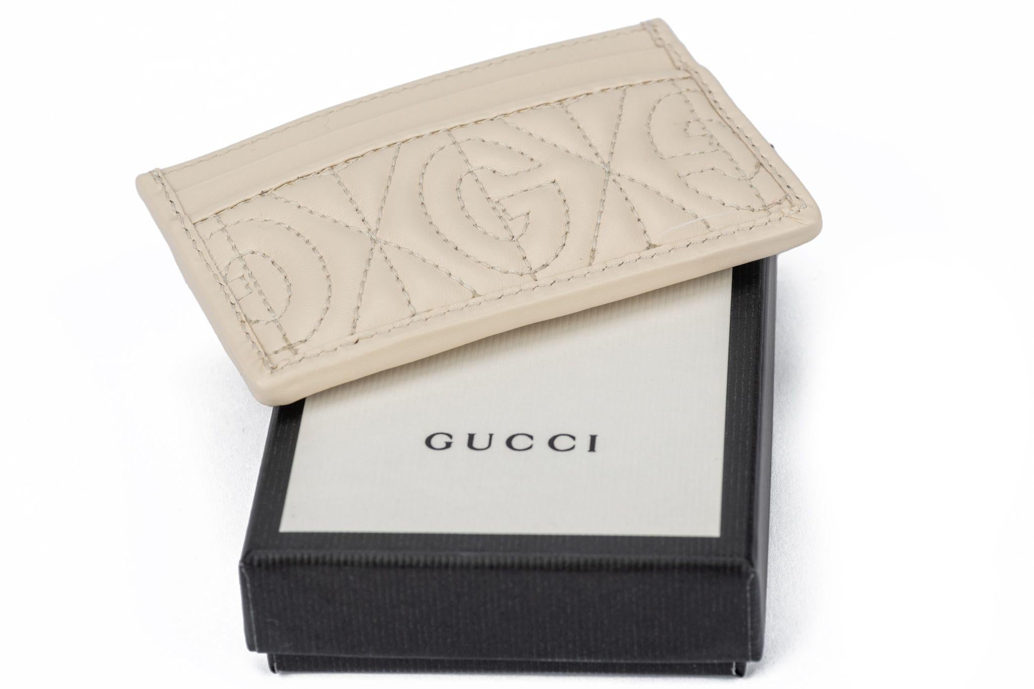 Gucci brand new cream embossed logo credit card case. 
Comes with booklets, original dustcover and box.