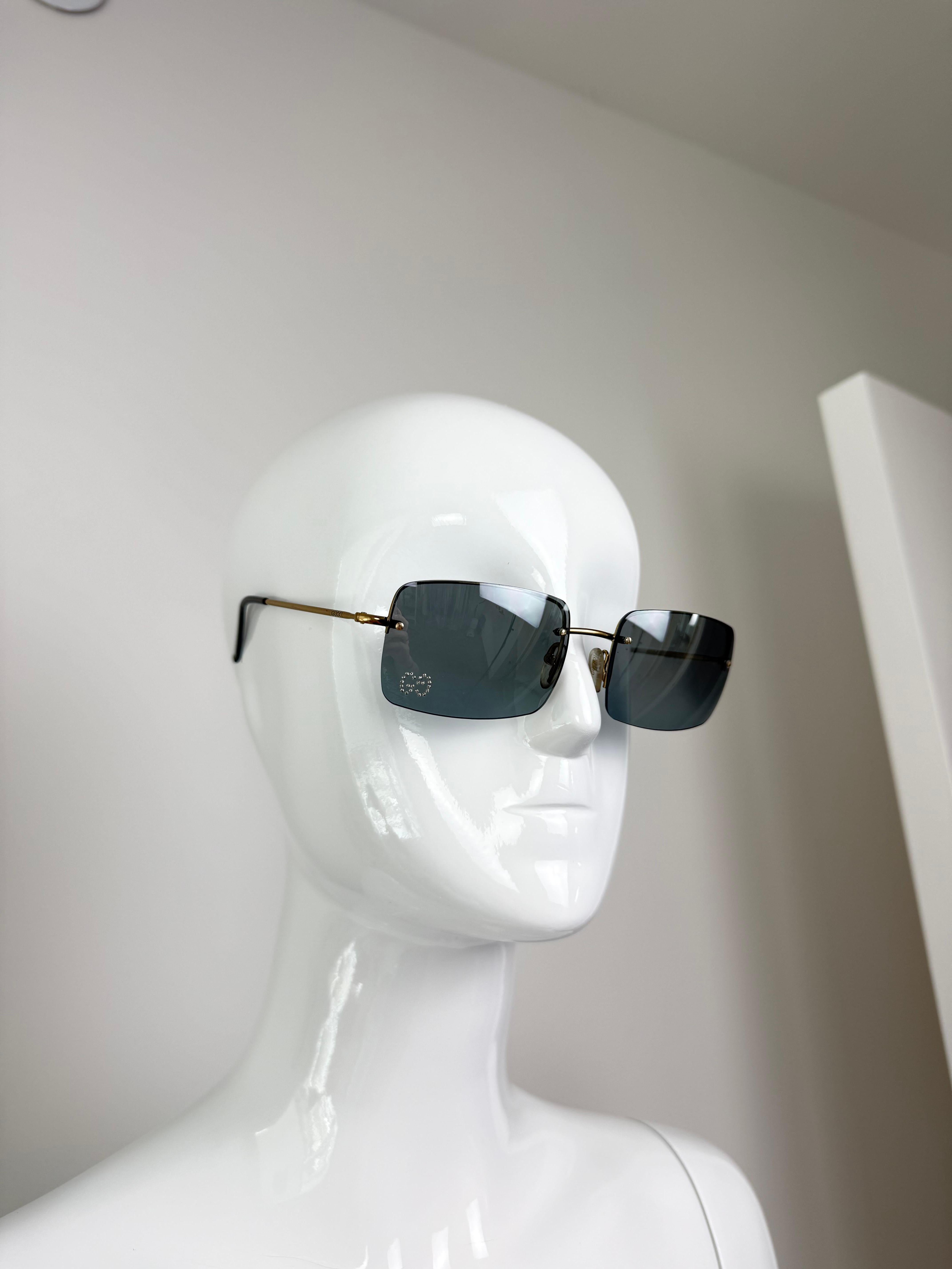 Gucci by Tom Ford
SS02
Vintage
Gold arms 
Rimless pewter reflective squoval lenses
Medium size
NWT's, no flaws
Comes with everything pictured

Final Sale