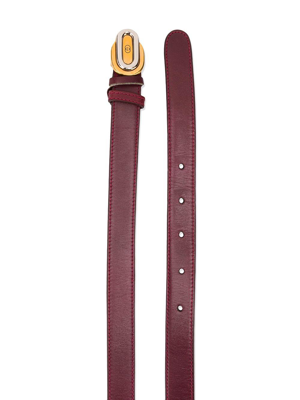 Crafted in Italy from bordeaux calf leather, this pre-owned belt by Gucci features an adjustable fit, a slim design and the signature 'GG' logo buckle accented by an intricate combination of both silver and gold-toned metal hardware.

Colour: