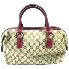 Gucci Vintage Gucci 1970s Burgundy Monogram Canvas & Leather shoulder –  Palm Beach Vintage