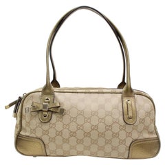 Gucci Boston Monogram Bow Princy 867467 Gold Canvas Satchel