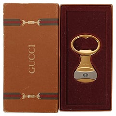 Ouvre-bouteille Gucci dans son emballage d'origine Vintage By, Italie années 70