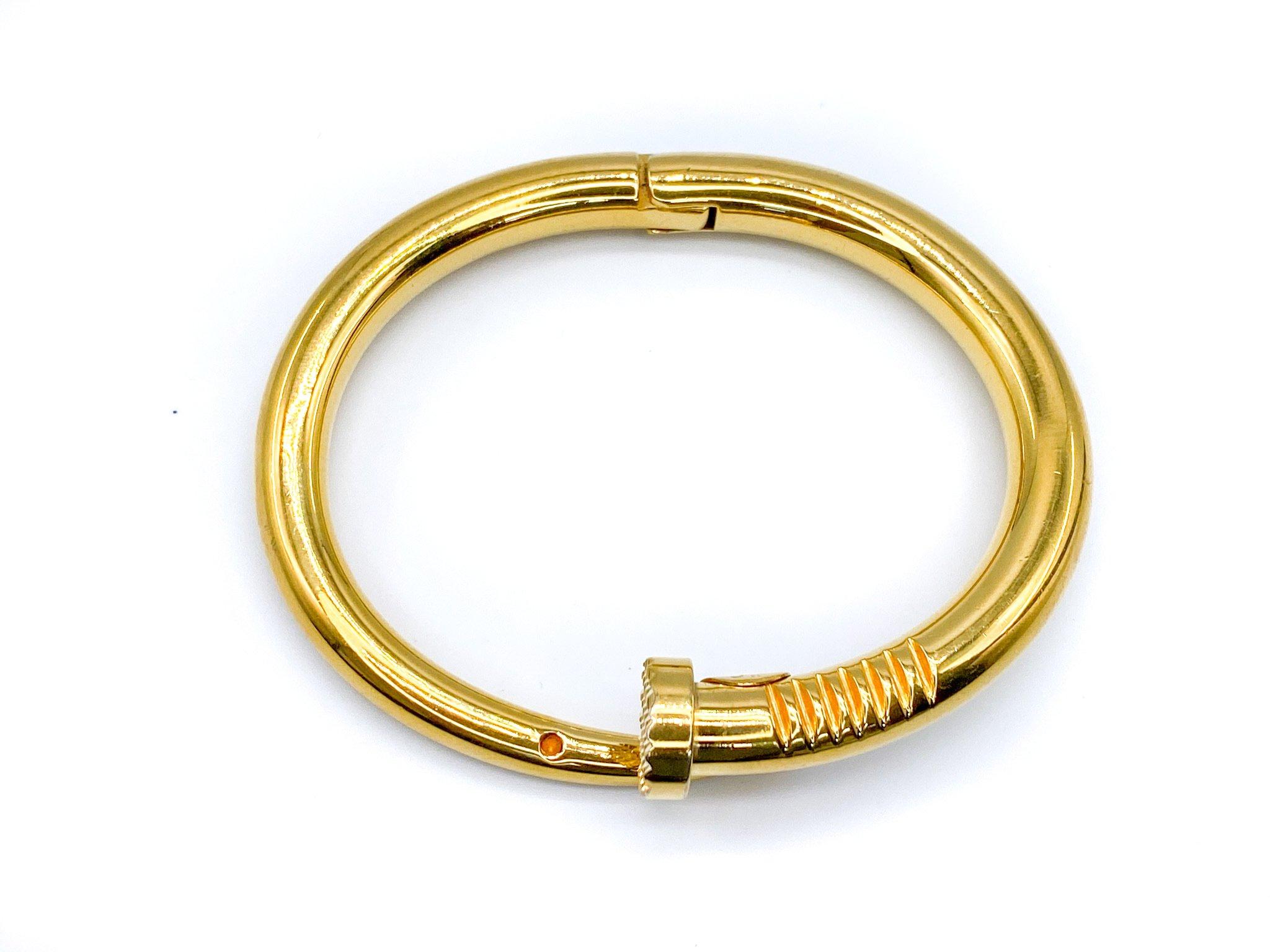Gucci 1990s Vintage Bangle Bracelet. 

This is a timeless classic piece from the Gucci 90s archive. This is a solid piece, cast from gold plated metal. I just love vintage Gucci for it’s classic unisex appeal. 

Inner circumference measures approx 6
