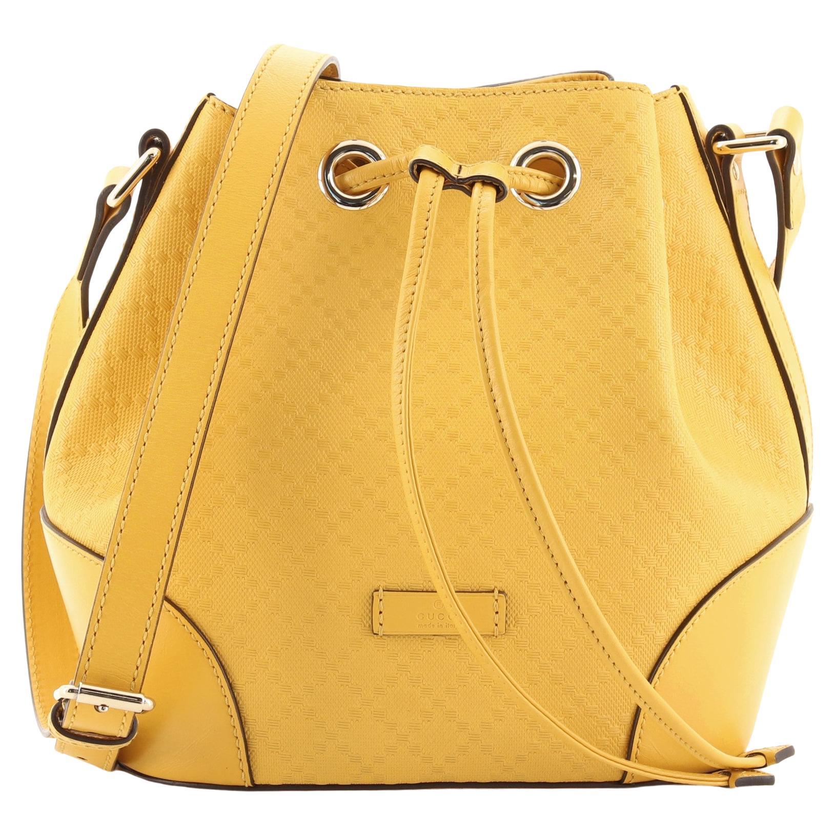 Gucci Mustard Patent Leather Small Interlocking GG Shoulder Bag at