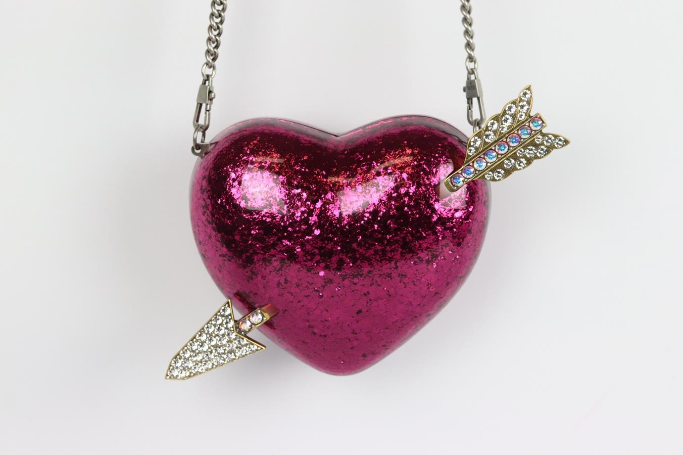 Gucci Broadway Heart crystal embellished glittered perspex shoulder bag. Made from glittered pink perspex in the shape of a heart with an antiqued-gold tone arrow. Pink perspex. Magnetic snap fastening at top. Does not come with dustbag or box.