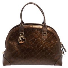 Gucci Bronze Guccissima Leather Heart Bit Charm Dome Satchel