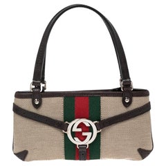 Gucci Brown/Beige Canvas and Leather Reins Pochette Clutch Bag