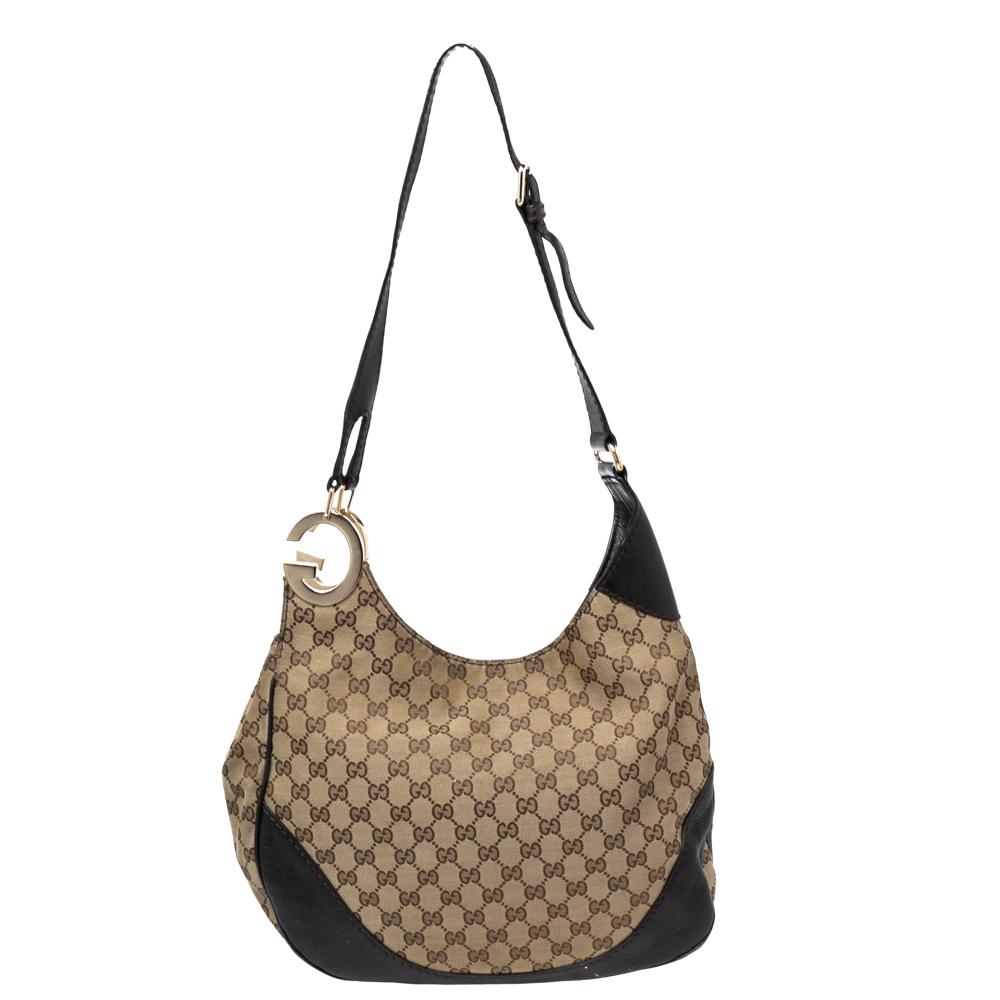 Durable and classy in its construction, this Miss GG tote from Gucci is worth the money! It comes crafted from signature GG canvas and leather with a single shoulder handle and a G motif on one side. It has a spacious interior capable of carrying