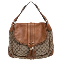 Braun/Beige GG Canvas und Leder Marrakesch Umhängetasche mit Klappe