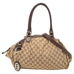 Gucci Brown/Beige GG Tasche aus Segeltuch und Leder Sukey Boston