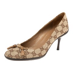 Gucci Brown/Beige GG Canvas Bow Pumps Size 37.5