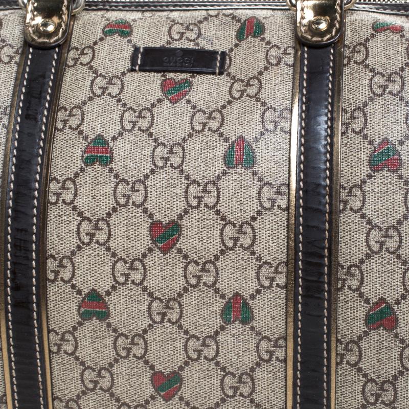 Gucci Brown/Beige GG Supreme Canvas Medium Tattoo Hearts Joy Boston Bag In Excellent Condition In Dubai, Al Qouz 2