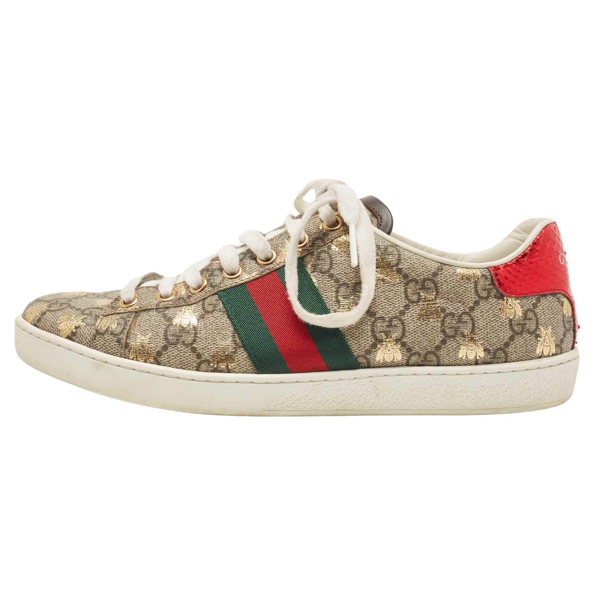 Beige gg supreme best sale new ace sneakers
