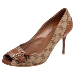 Gucci Brown/Beige Leather and GG Canvas Tassel Detail Peep-Toe Pumps Size 39.5