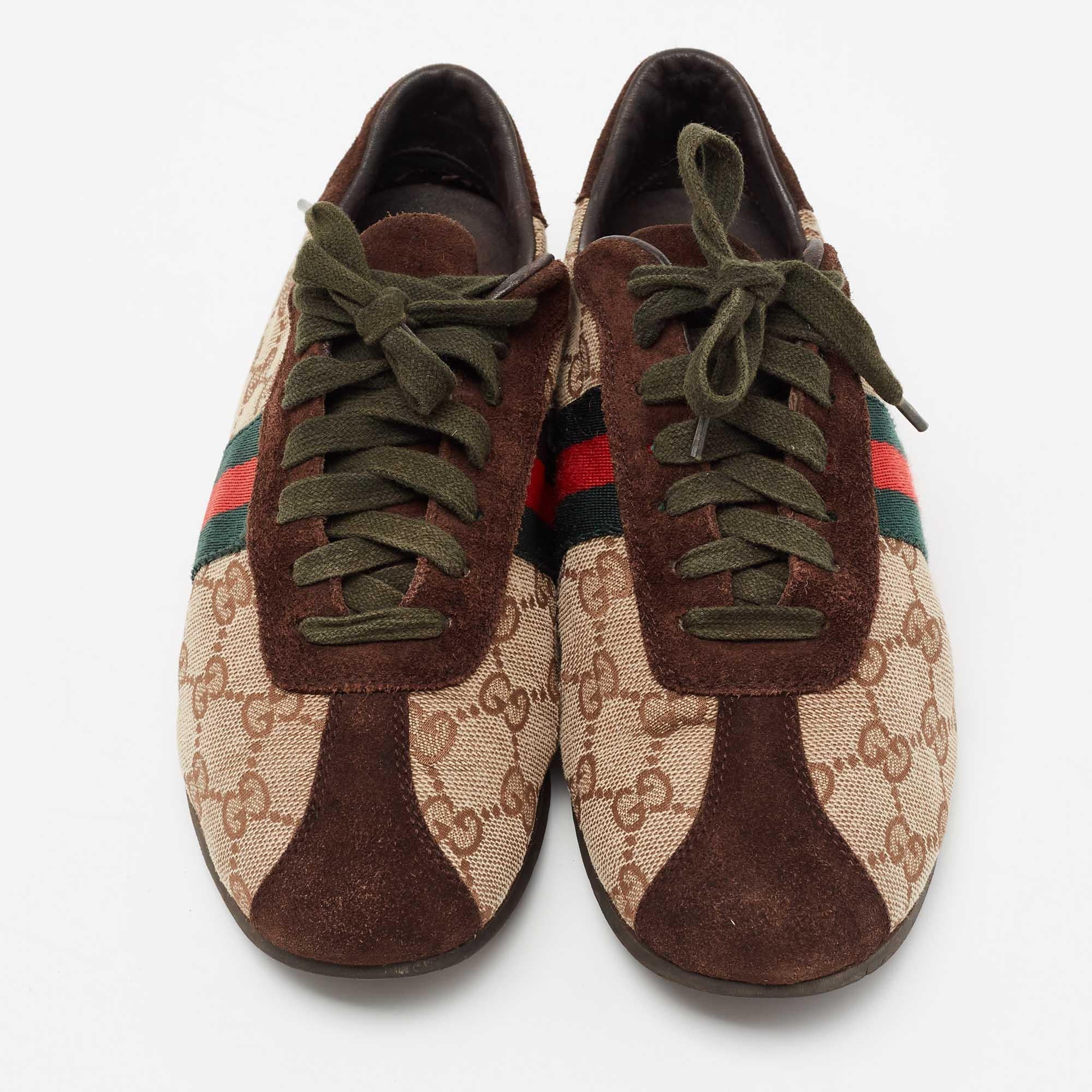 Step into these Gucci sneakers for instant comfort! They feature the iconic Web stripes and suede trims on the GG canvas exterior. The low-tops are lined with leather and finished with lace-ups. Team them with casuals for a sporty and fashionable