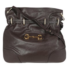 Gucci, pelle di vitello marrone con morsetto 1955