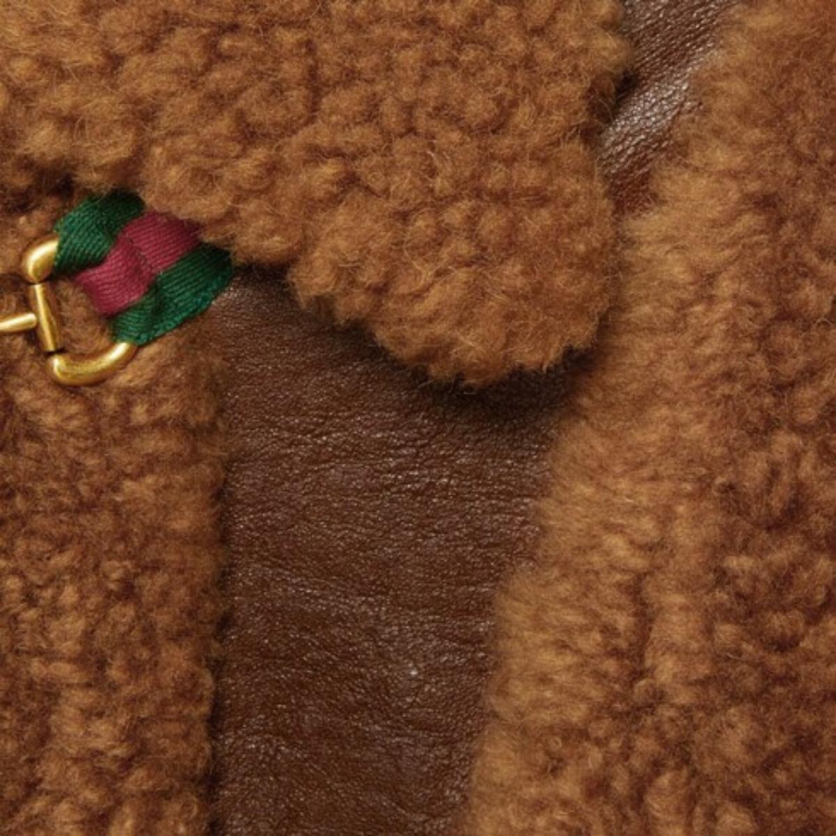 Gucci - Veste en peau de mouton marron bouclée, taille IT 42 Neuf - En vente à Brossard, QC