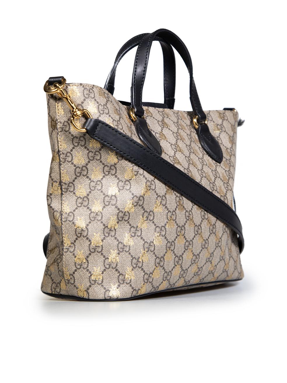 CONDITION is Very good. Minimal wear to bag is evident. Minimal wear to inner lining with light discolouration marks on the zipped pocket on this used Gucci designer resale item.
 
 
 
 Details
 
 
 Brown
 
 Coated canvas
 
 GG and bee print
 
