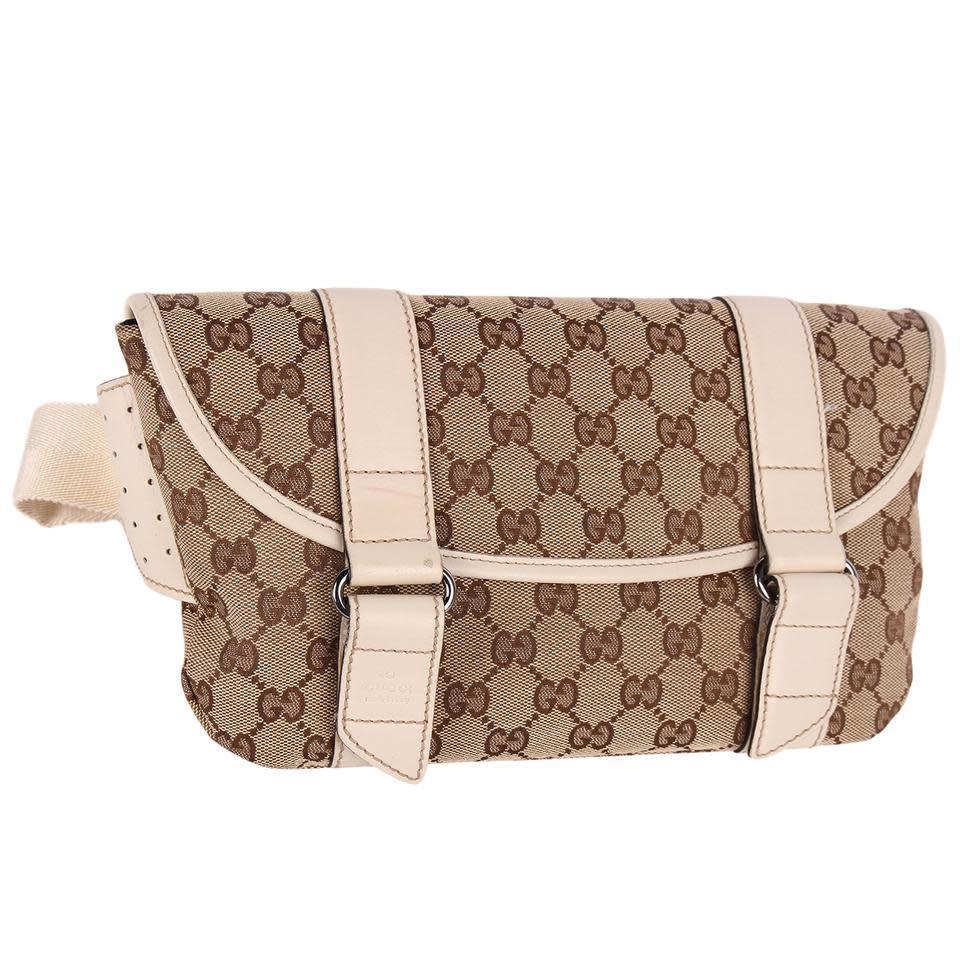 This belt bag is made with canvas with Gucci signature monogram print with brown leather finishes. Featuring front flap closure, long adjustable waist strap, cream leather accents, velcro front closure, brown textile interior lining with zipper