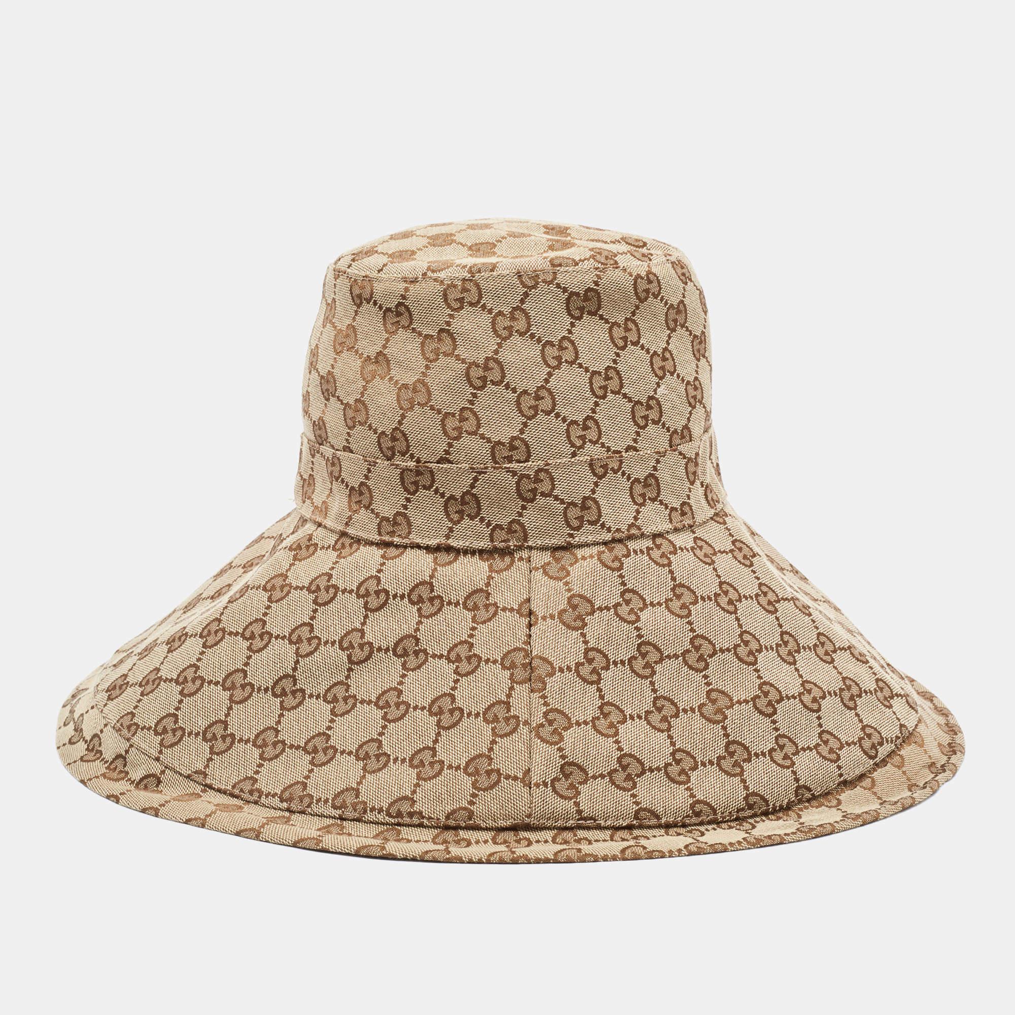 Head out looking totally trendy and chic with this bucket hat from Gucci. It has been made using GG canvas, thus making it the perfect summer accessory. It has a wide brim.

