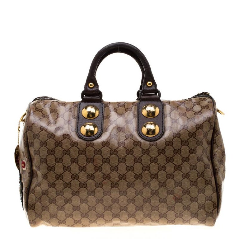 GUCCI, a black monogram canvas Boston Bag. - Bukowskis