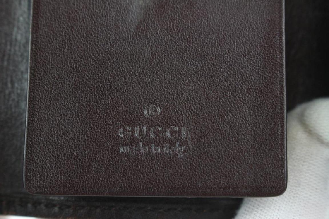 Noir Gucci Portefeuille Gucci en cuir marron GG Guccissima 6 avec porte-clés 2ga112 en vente