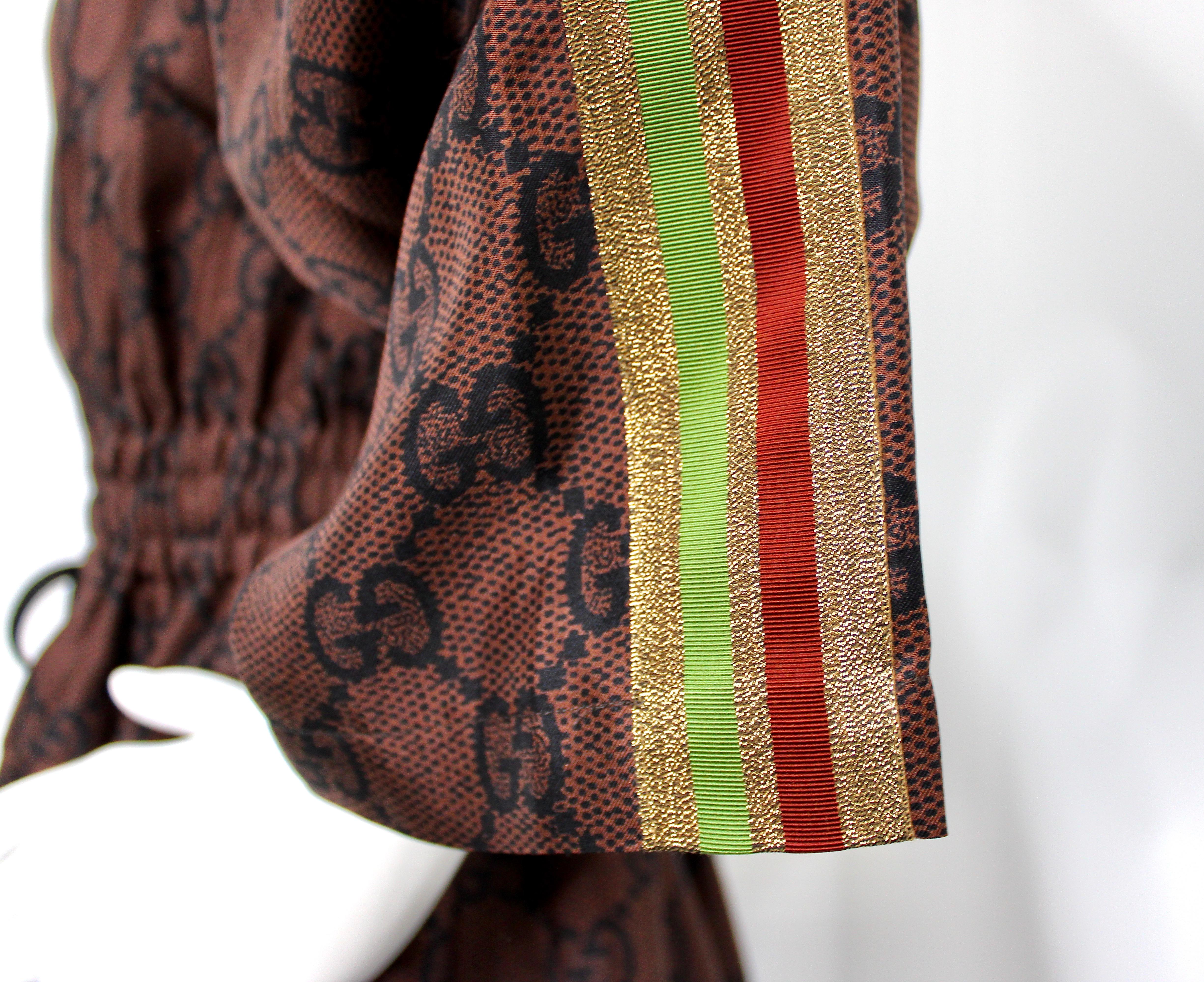 Donna Mini abito Gucci marrone GG Supreme con coulisse in vita e mezza zip in vendita