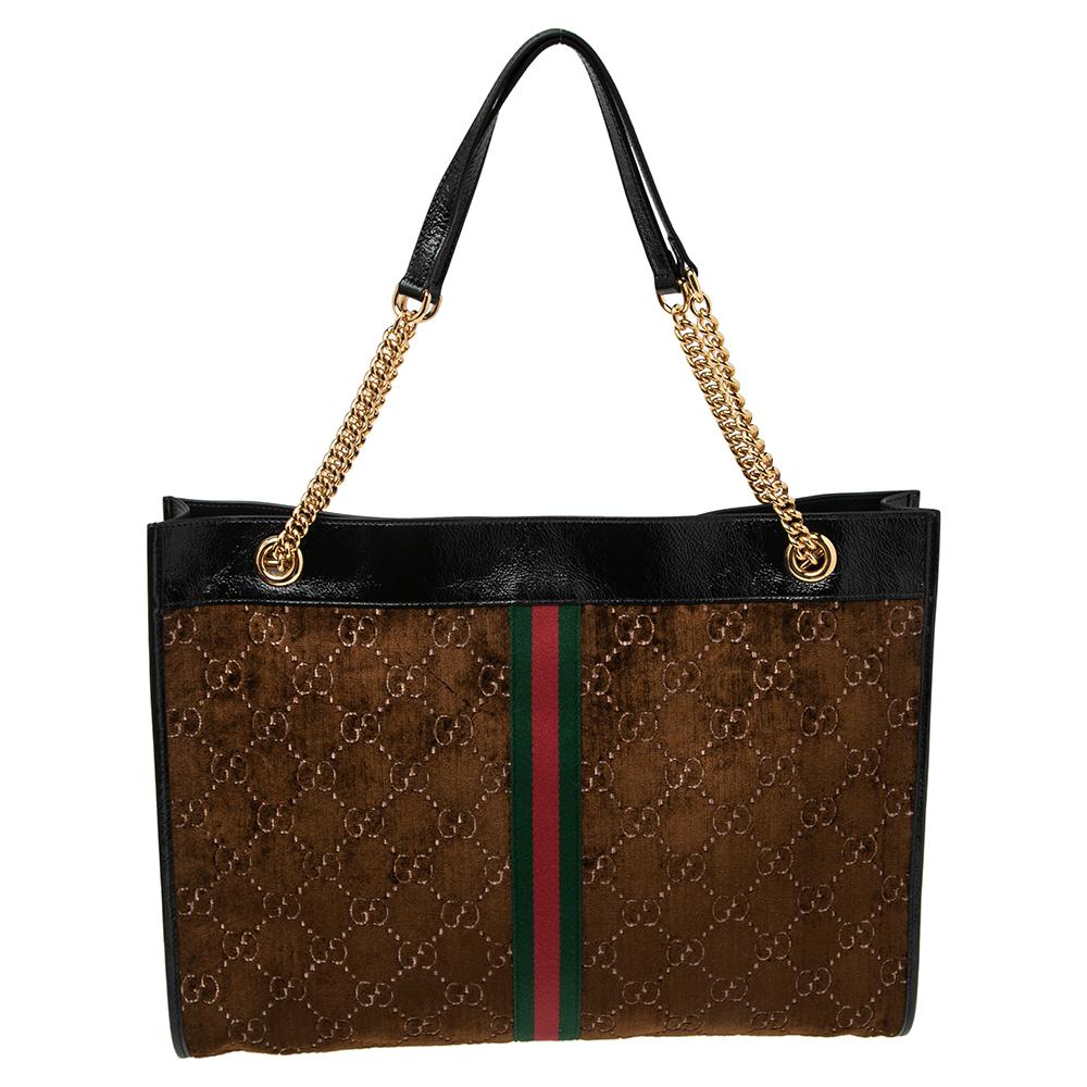 Channel your love for luxurious styles with this velvet tote. The well-sized Alcantara interior and the dual shoulder handles make this bag functional. This Rajah tote by Gucci has been designed to assist you with utmost ease on all days. It is