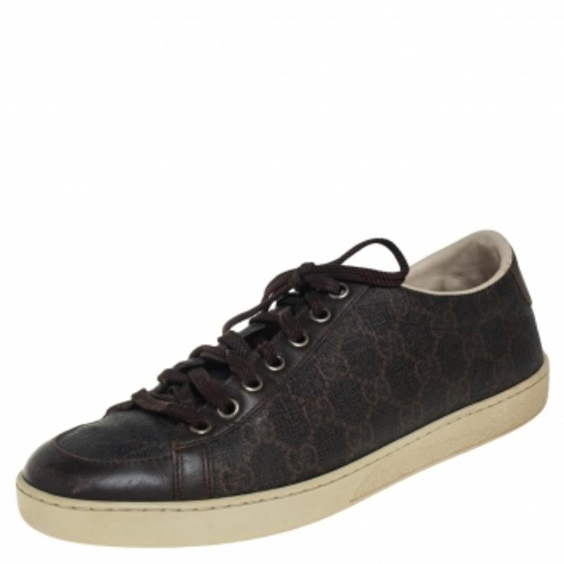 These stylish sneakers by Gucci are all you need to uplift a casual outfit. It is rendered in Guccissima-coated canvas and leather and styled with laces on the vamps and round toes. Wear these low-top sneakers with all your causals.