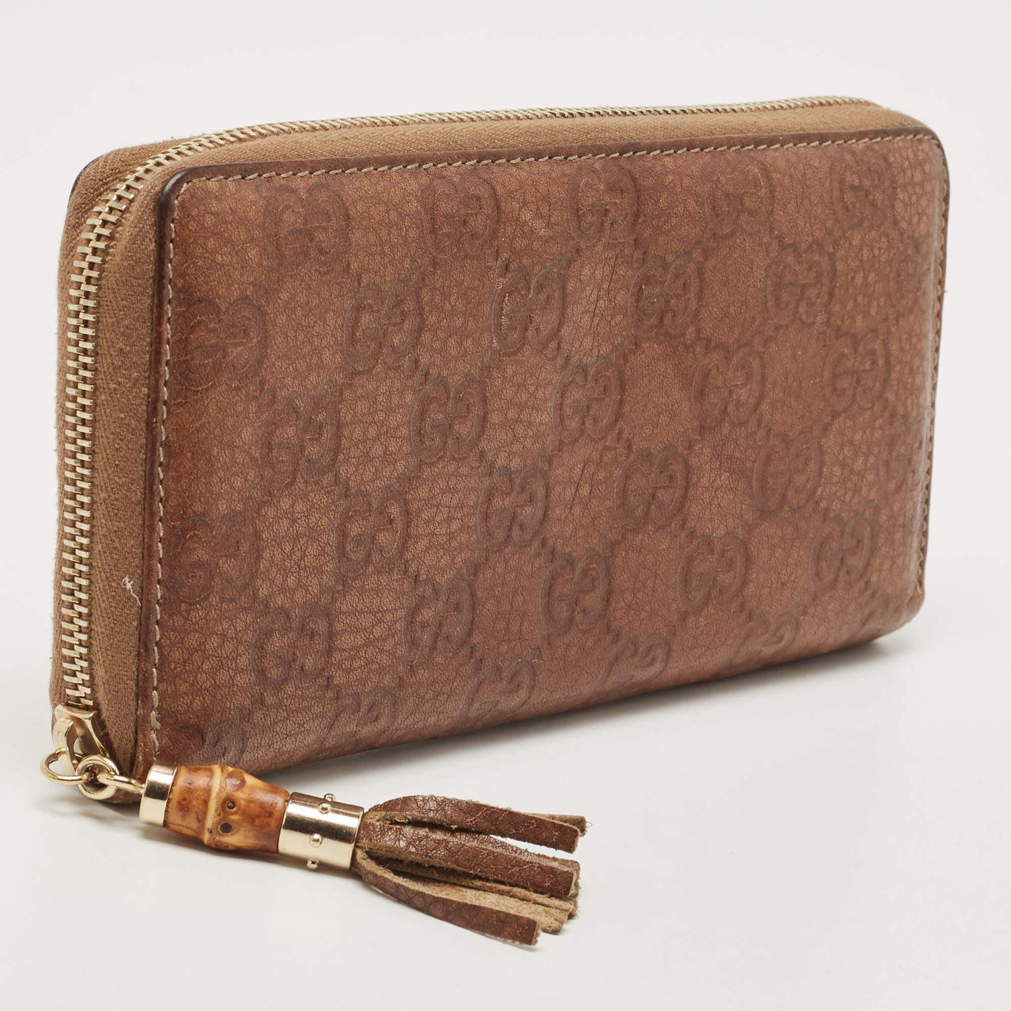 Gucci Brown Guccissima Leather Bamboo Tassel Zip Around Wallet In Good Condition For Sale In Dubai, Al Qouz 2