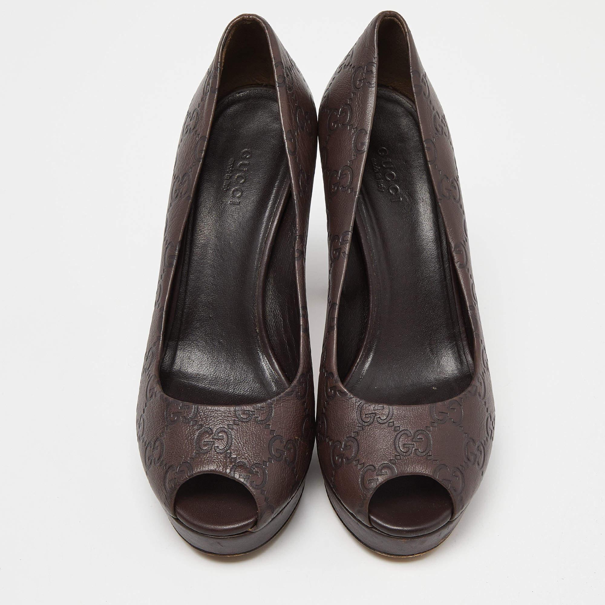 These Gucci pumps blend comfort and style perfectly! The brown pumps are crafted from Guccissima leather into a peep-toe silhouette and are elevated on slim heels.

 Includes: Original Dustbag, Original Box

