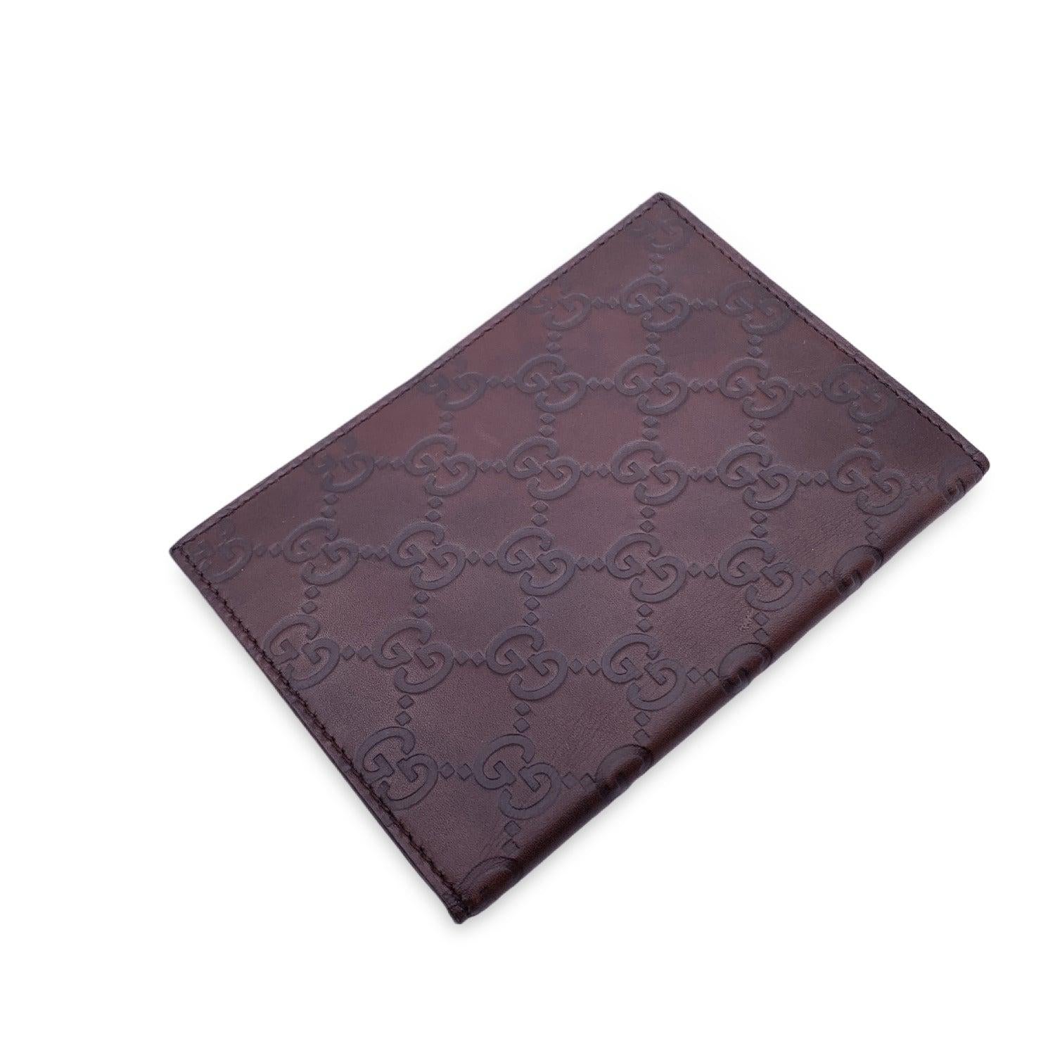 A quiet keepsake with timeless charm, this GUCCI bifold picture display is a heartfelt blend of luxury and sentiment. Designed in rich dark brown Guccissima leather-subtly textured with the iconic GG motif-it's a piece that feels both intimate and
