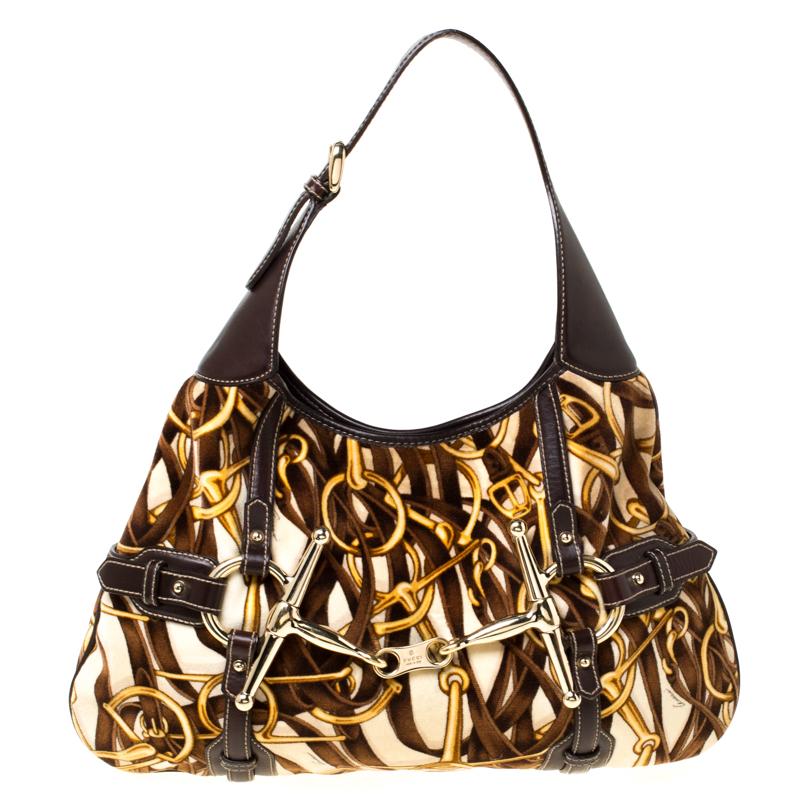 It is rare to find a limited edition piece as gorgeous as this Gucci hobo. Every feature on it is awe-inspiring which makes the creation all the more worthy of being owned. The Brit hobo was introduced in celebration of their 85th anniversary and it