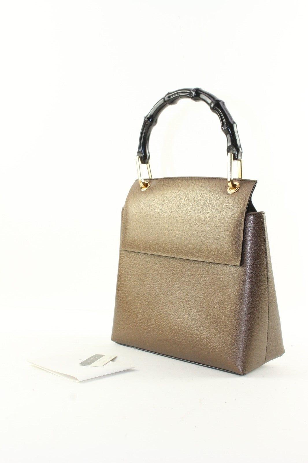 Gucci Brown Leather Bamboo Tote 3GK1214K
Date Code/Serial Number: 0011181838

Made In: Italy 

Measurements: Length:  8