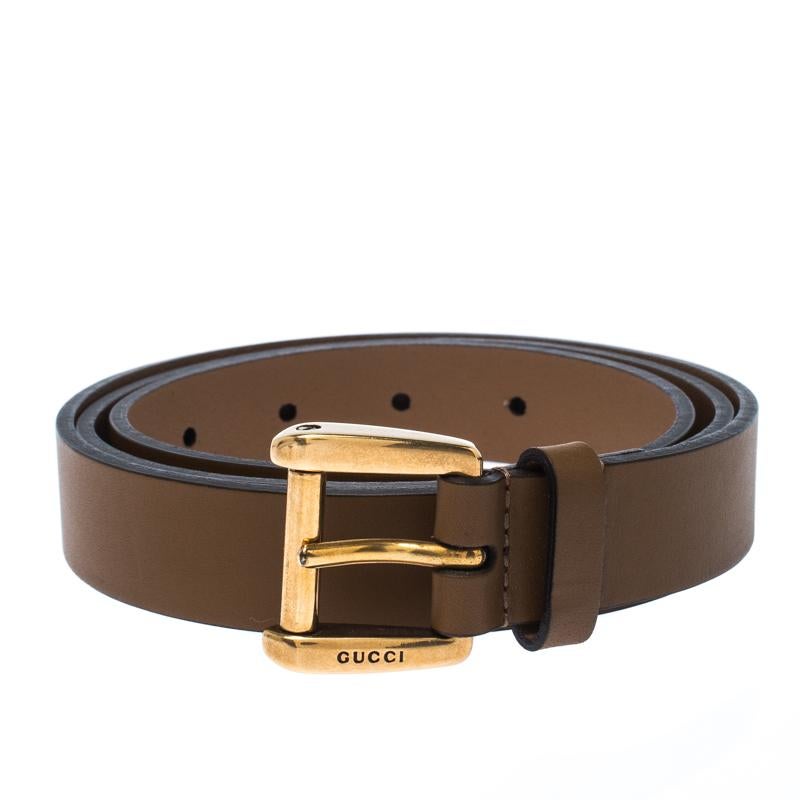 A staple accessory, add this Gucci belt to your classic collection today. This durable belt is crafted from brown leather and is completed with a slender gold-tone pin buckle and a single leather loop.


Includes: Original Dustbag

