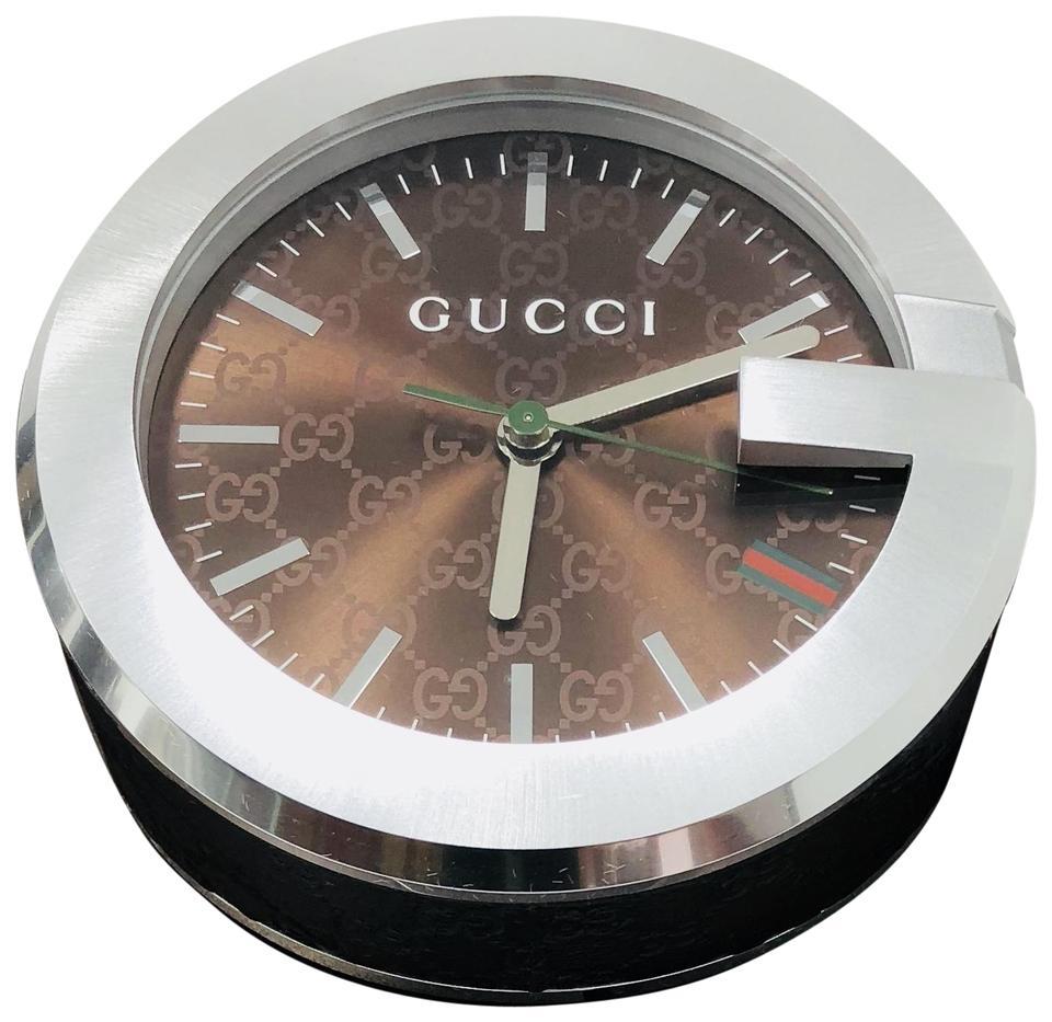 Brand:Gucci

Color:Brown

Style/Collection:Gucci Leather Desk Decor Clock Brown

Type:Watches

Style Tags:Gucci Watches gucci clock