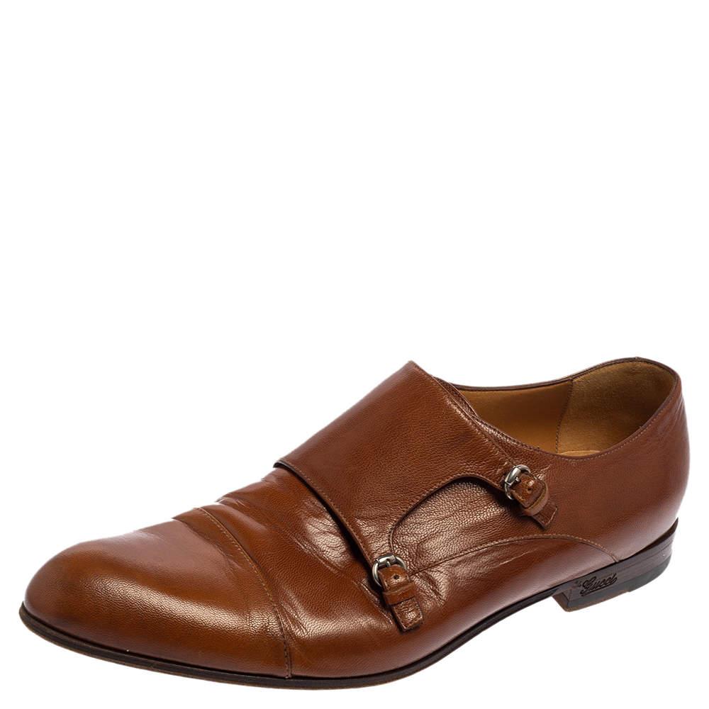 These Gucci shoes are a must-have. Crafted in Italy, they are made from brown leather. They are styled with double monk straps with on the uppers, stitch detailing and a smooth finish. They are finished with leather lining, insoles and soles.
