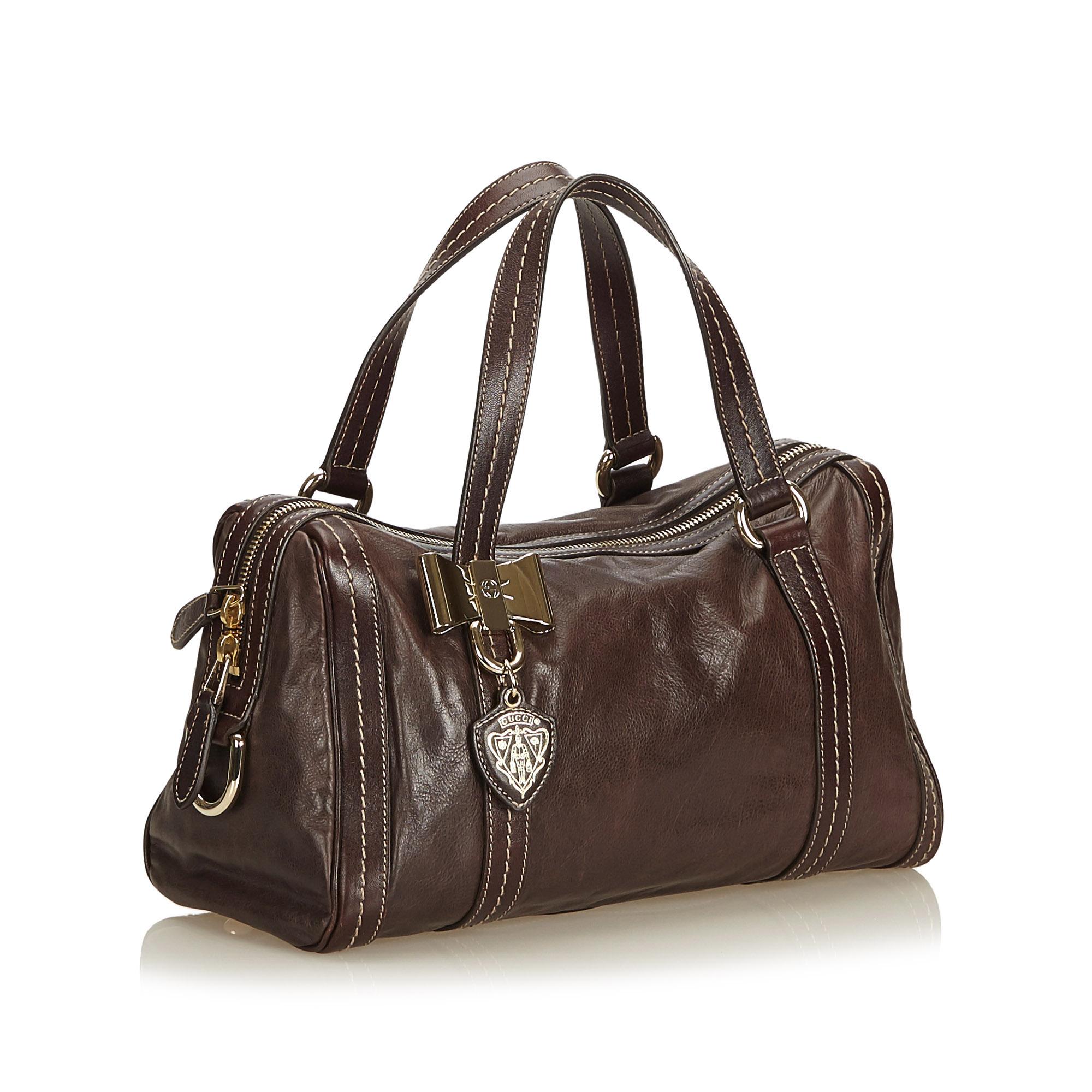 The Duchessa features a leather body, flat straps, a top zip closure, interior slip pockets, and an interior zip pocket. It carries as B+ condition rating.

Inclusions: 
This item does not come with inclusions.

Dimensions:
Length: 18.00 cm
Width: