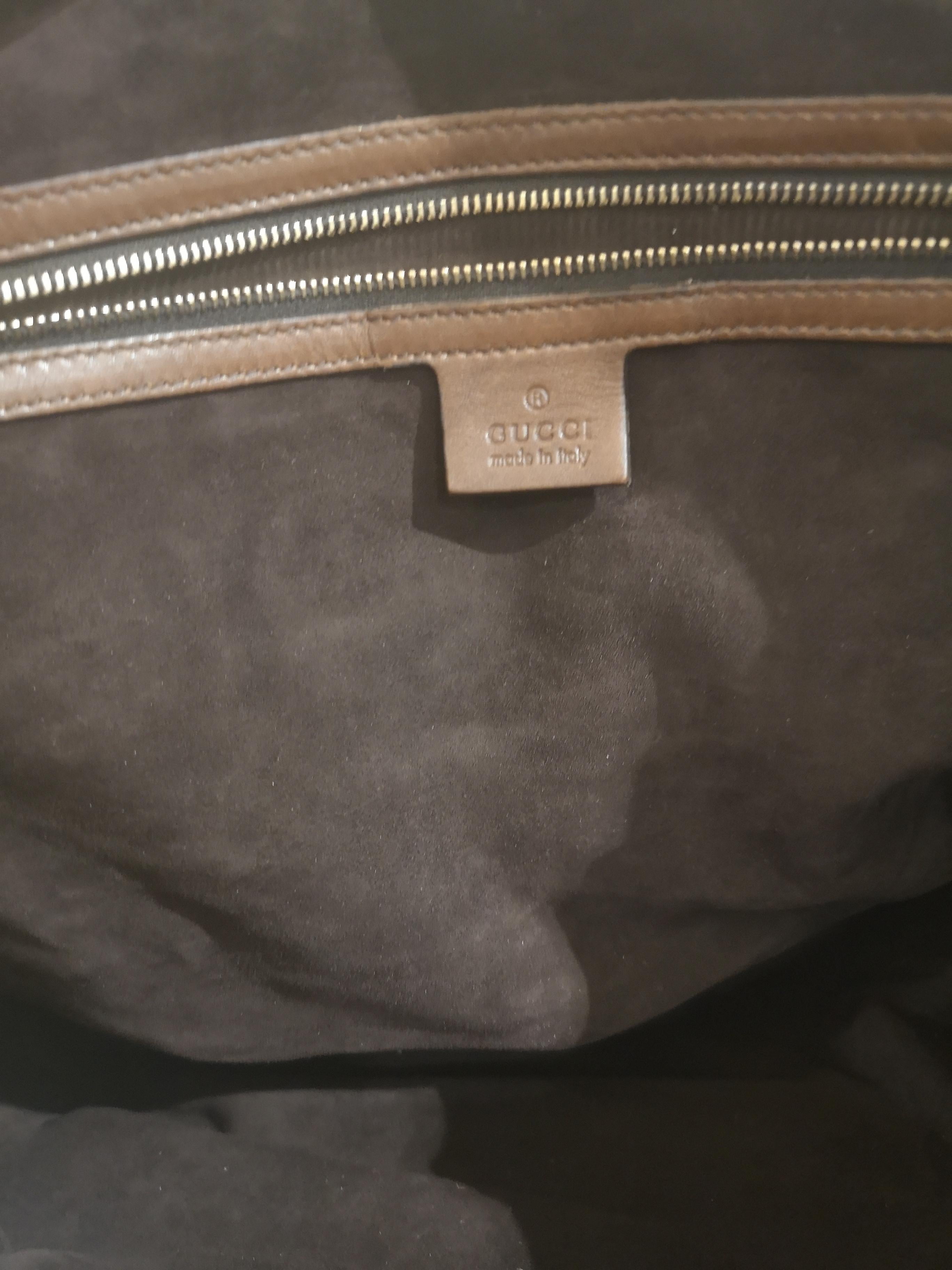 Brown Gucci brown leather handle shoulder bag