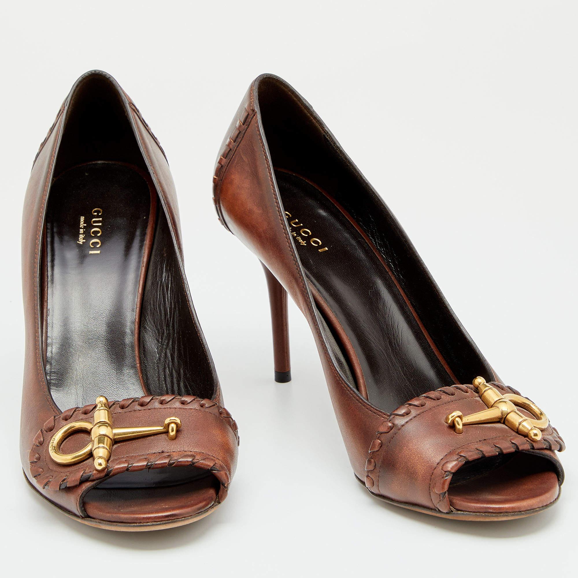 Gucci's timeless aesthetic and stellar craftsmanship in shoemaking is evident in these stunning pumps. Crafted from leather in a brown shade, they are topped with the signature Horsebit accent and mounted on tall heels for the right amount of