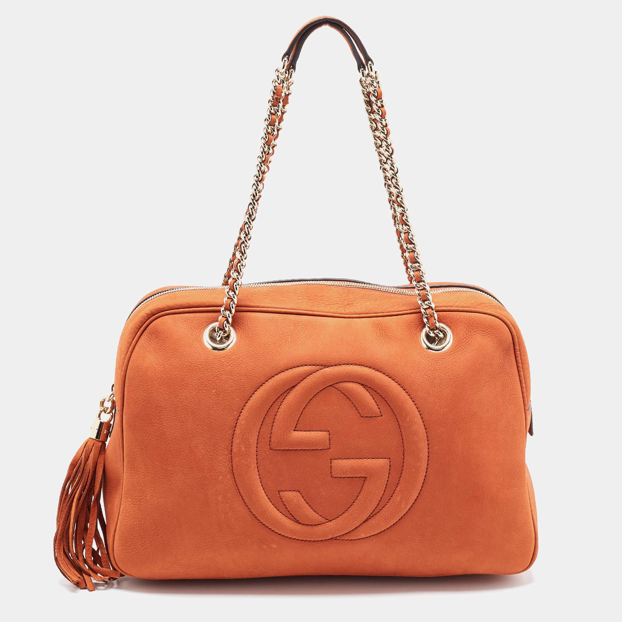 Indulge in luxury with this Gucci Soho bag. Meticulously crafted from premium materials, it combines exquisite design, impeccable craftsmanship, and timeless elegance. Elevate your style with this fashion accessory.

